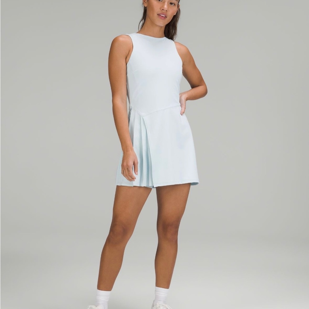 Nunlux asymmetrical tennis dress Lululemon size 4 power blue